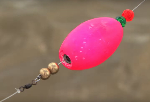 Deadly Combo rig for redfish fishing &acirc;€“ a popping cork with beads and balls to make snapping noises like shrimp.