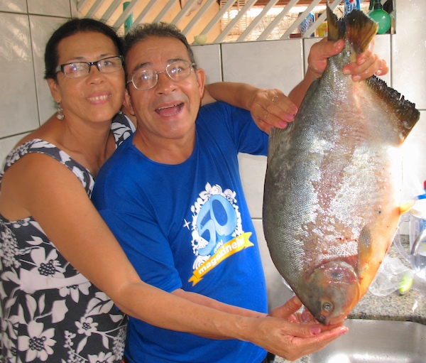A couple caught this Red-bellied Pacu fish showing typical adult coloration.
