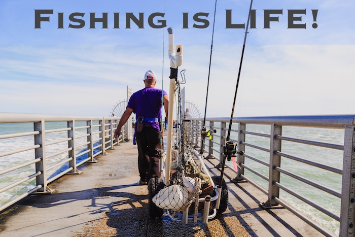 Fishing on a fishing pier in Florida, carrying fishing gear.