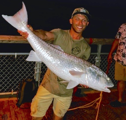 Huge redfish caught from pier in Florida.