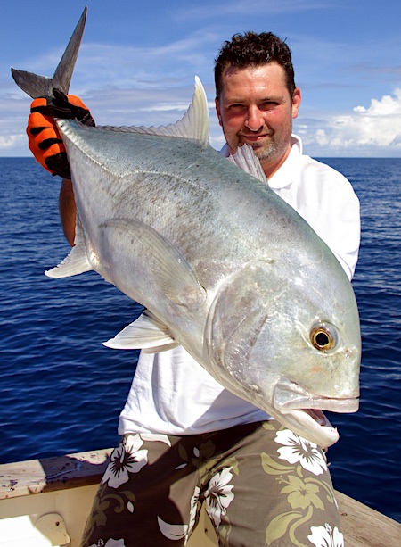 A medium size Giant Trevally (GT) fish caught on rod and reel.