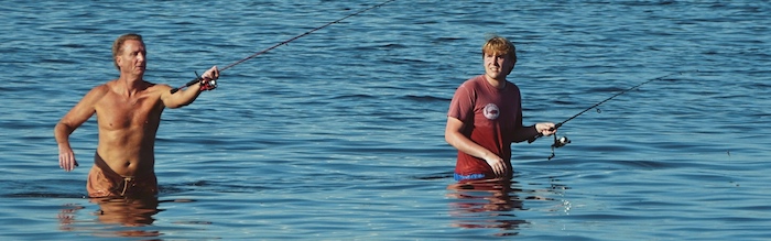 Two men wade-fishing the mangroves in Florida.