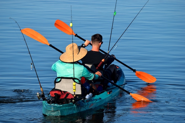 Tandem kayak fishing on the ocean in St. Augustine, Florida.