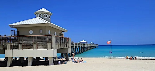 Juno Beach Fishing Pier from the sandy beach.
