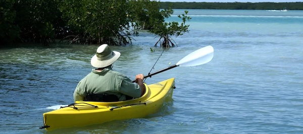 Fishing for reds from a kayak.