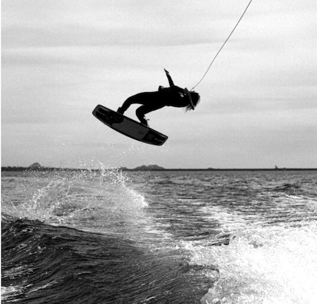 Surfrat gets clotheslined by a strong shark fishing line at the fishing pier.