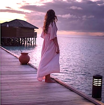 Woman wearing a dress at the fishing pier. What not to do.
