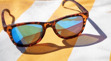 Sunglasses with polarization to cut sun glare and allow you to see fish in the water.